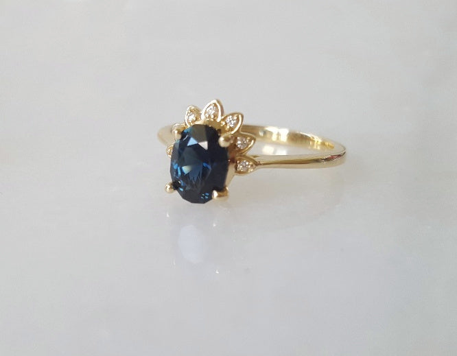 1.3ct Australian teal blue sapphire and diamond ring