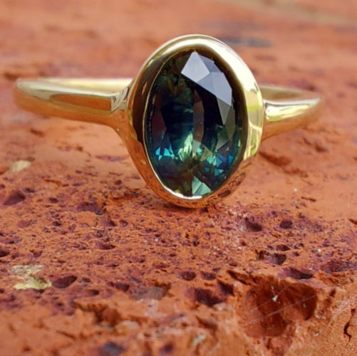 .90ct Teal Oval Australian Sapphire 9ct Yellow Gold ring