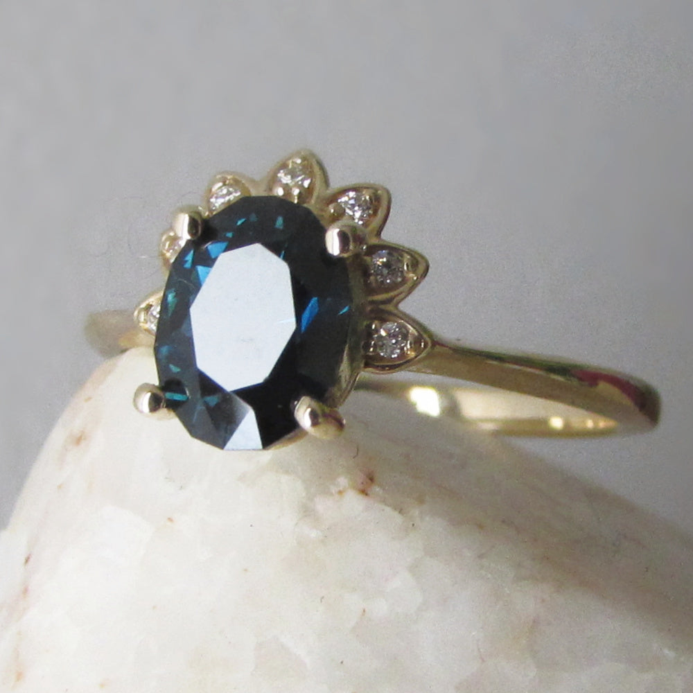 1.3ct Australian teal blue sapphire and diamond ring