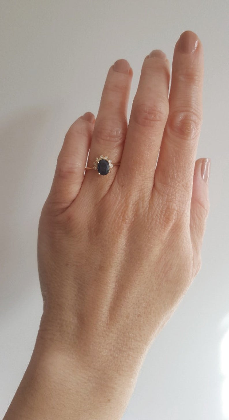 1.3ct Australian teal blue sapphire and diamond ring