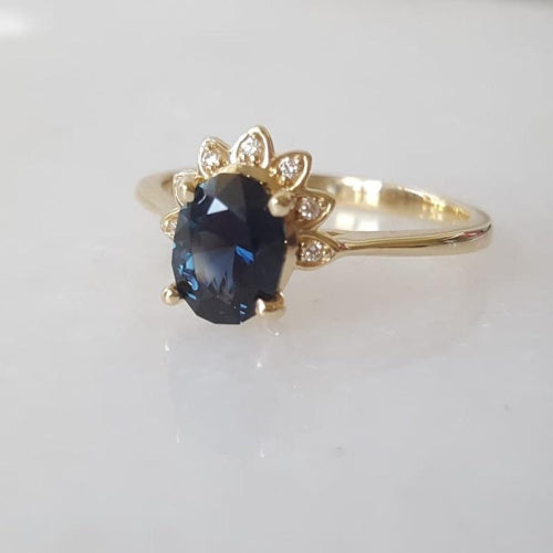 1.3ct Australian teal blue sapphire and diamond ring