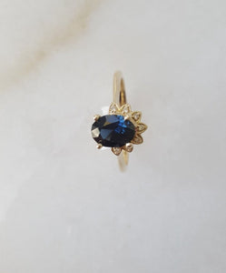 1.3ct Australian teal blue sapphire and diamond ring